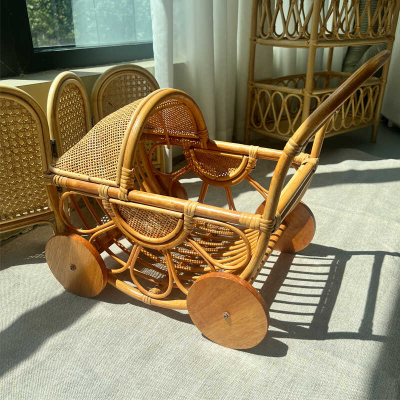 Geweven rotan kinderwagen Vint - Baby Nursery Plants recensie en prijs